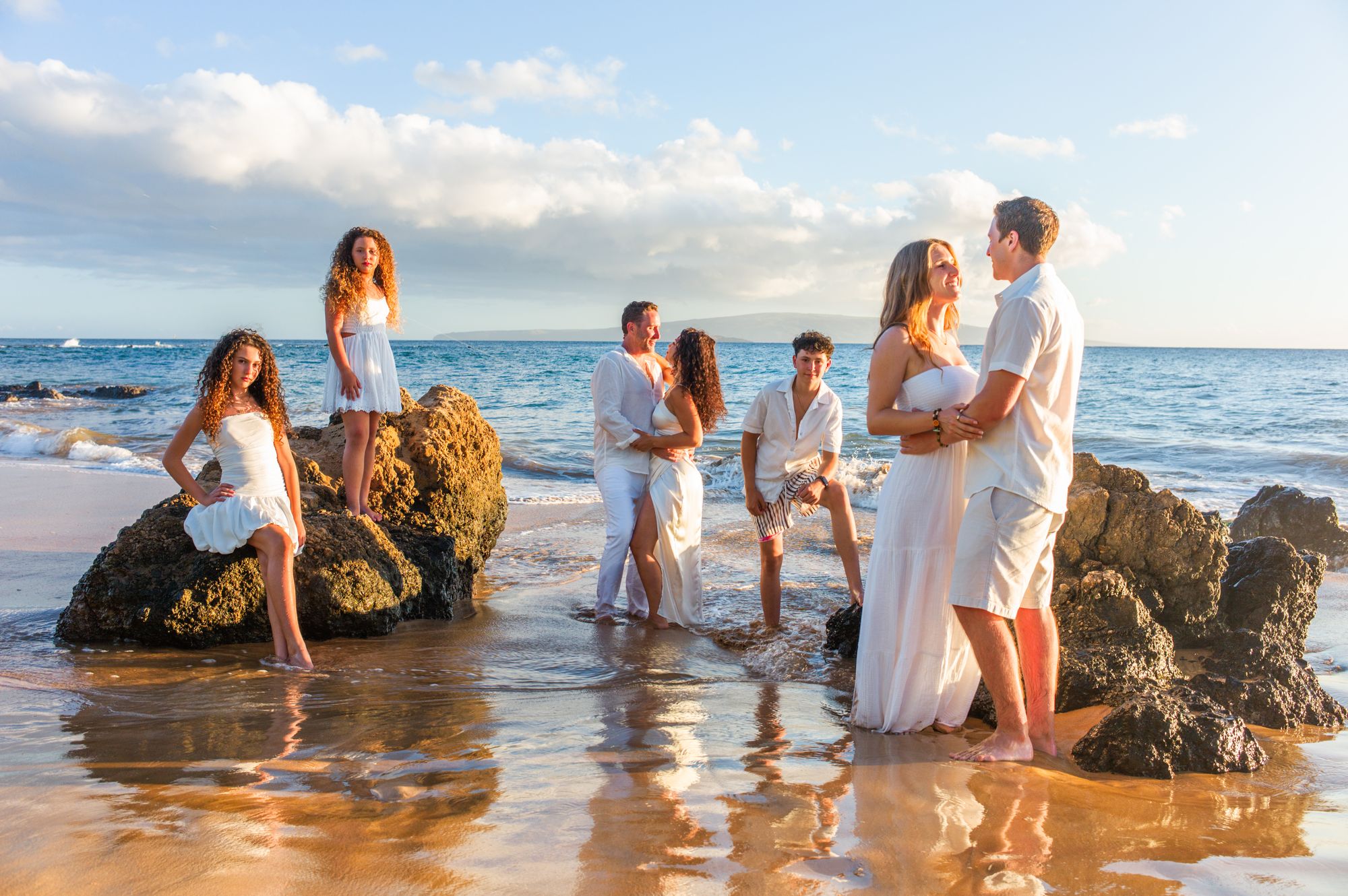 A family portrait created in the luminous landscape of Wailea, Maui