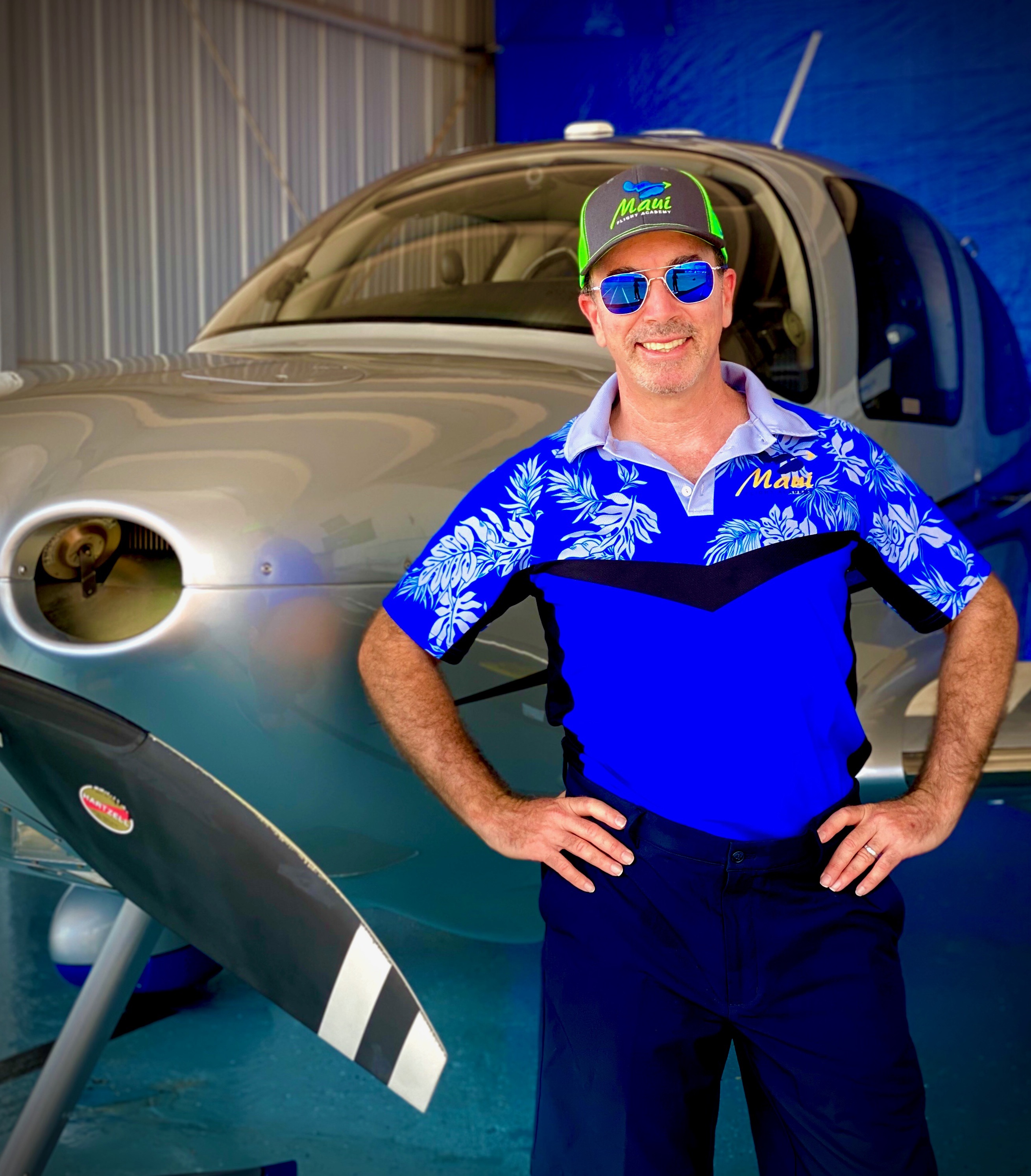 Laurence Balter of Maui Flight Academy beside an aircraft on Maui