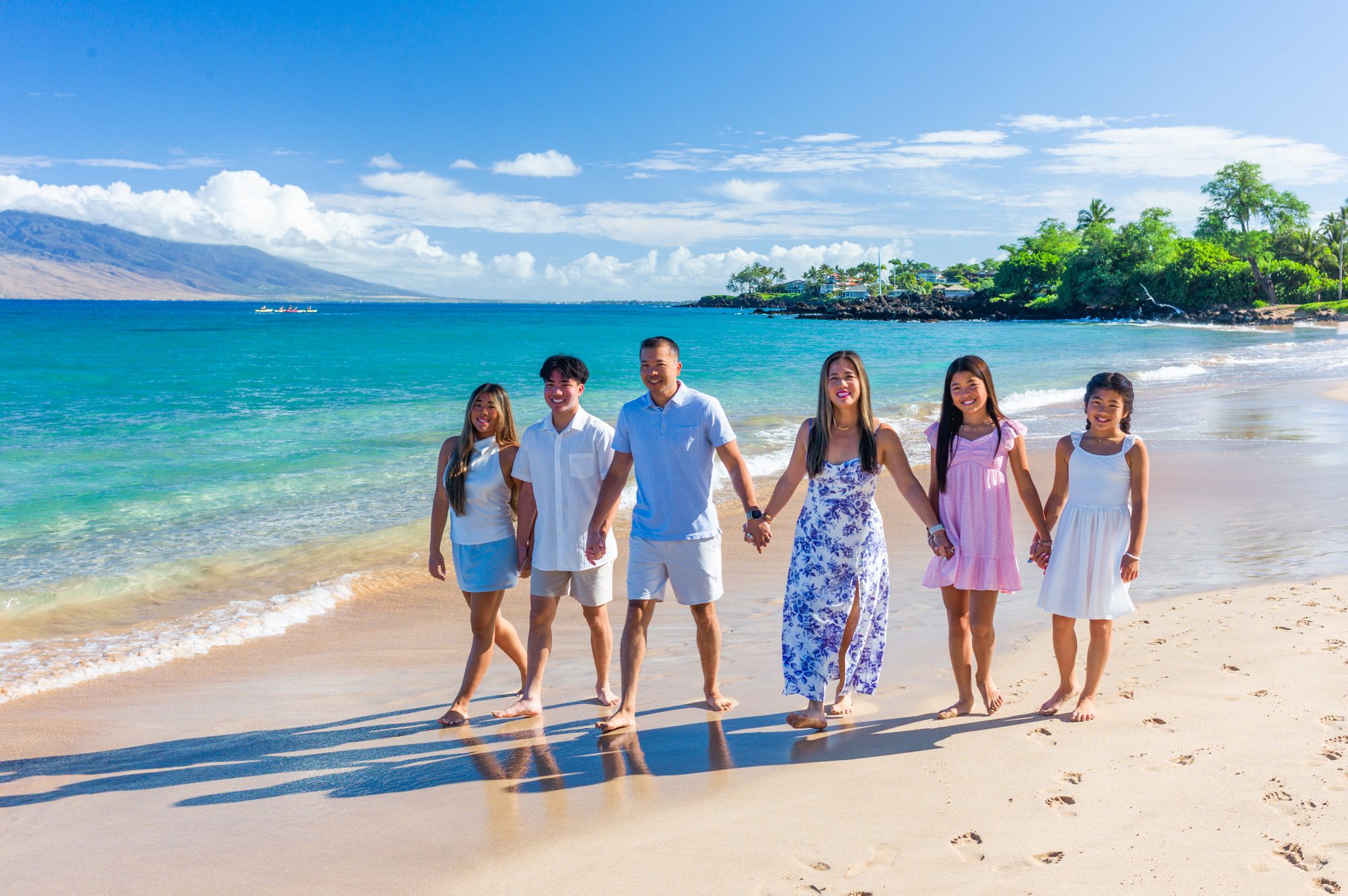A family photography session at Maluaka Beach