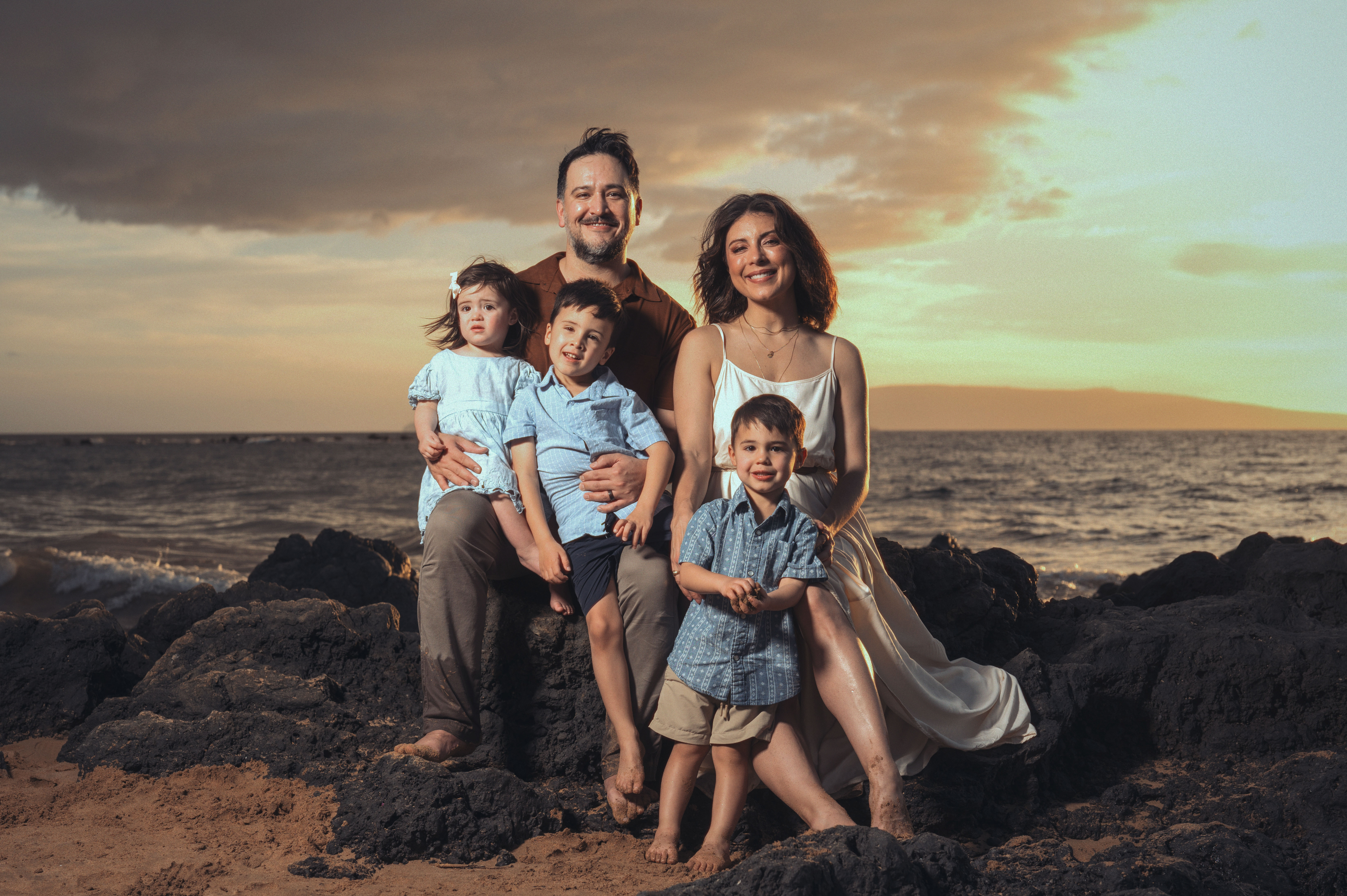 A family portrait at golden hour in Maui