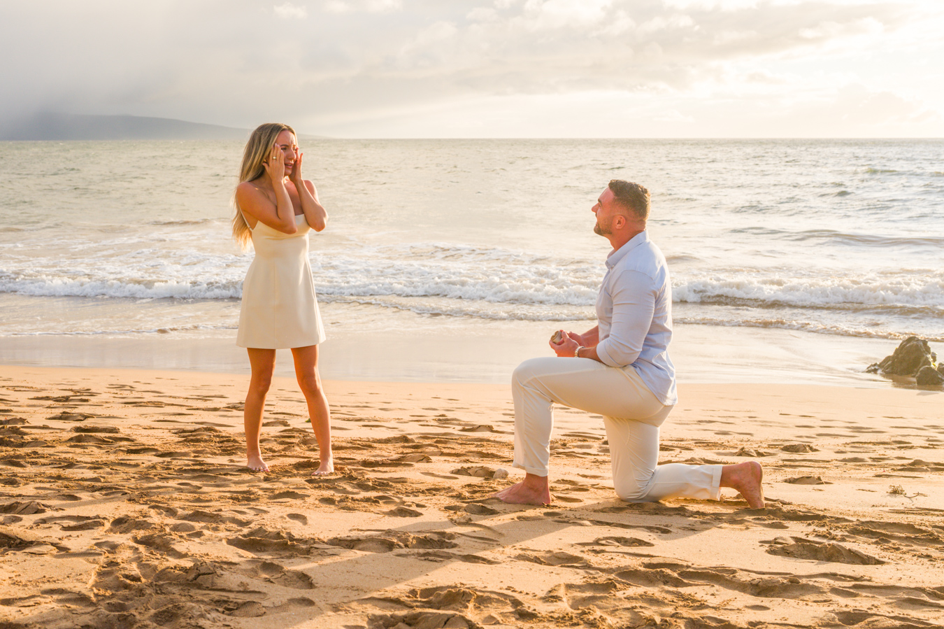 An emotional engagement moment photographed by Wailea Photo in Maui