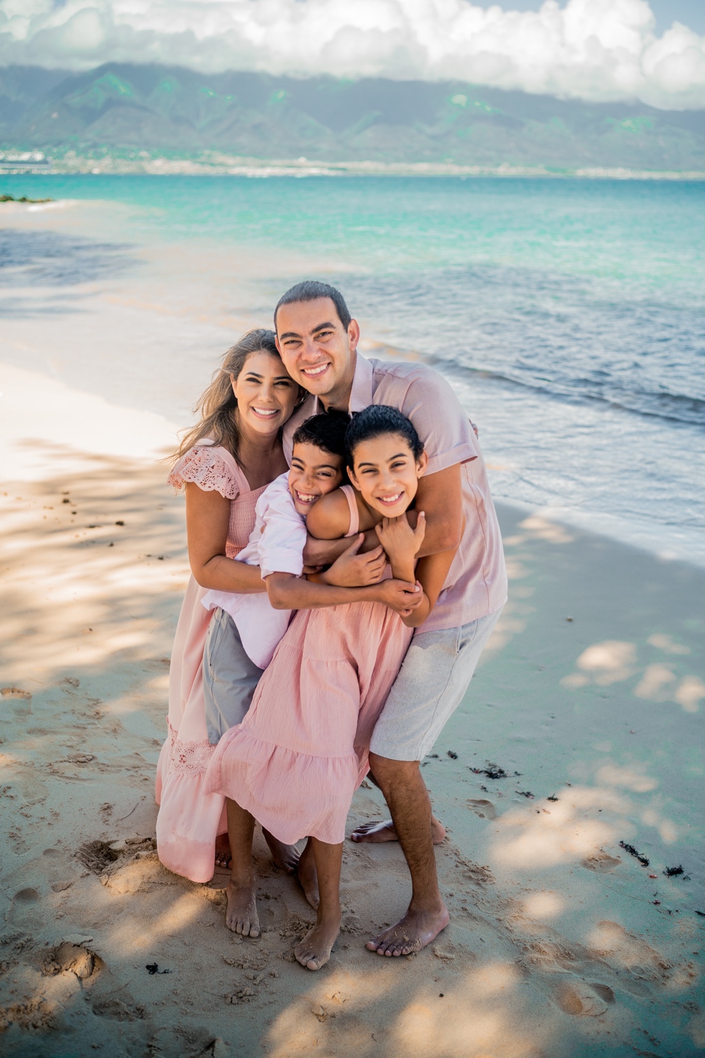 Family portrait photographed during a Turquoise + Water session on Maui