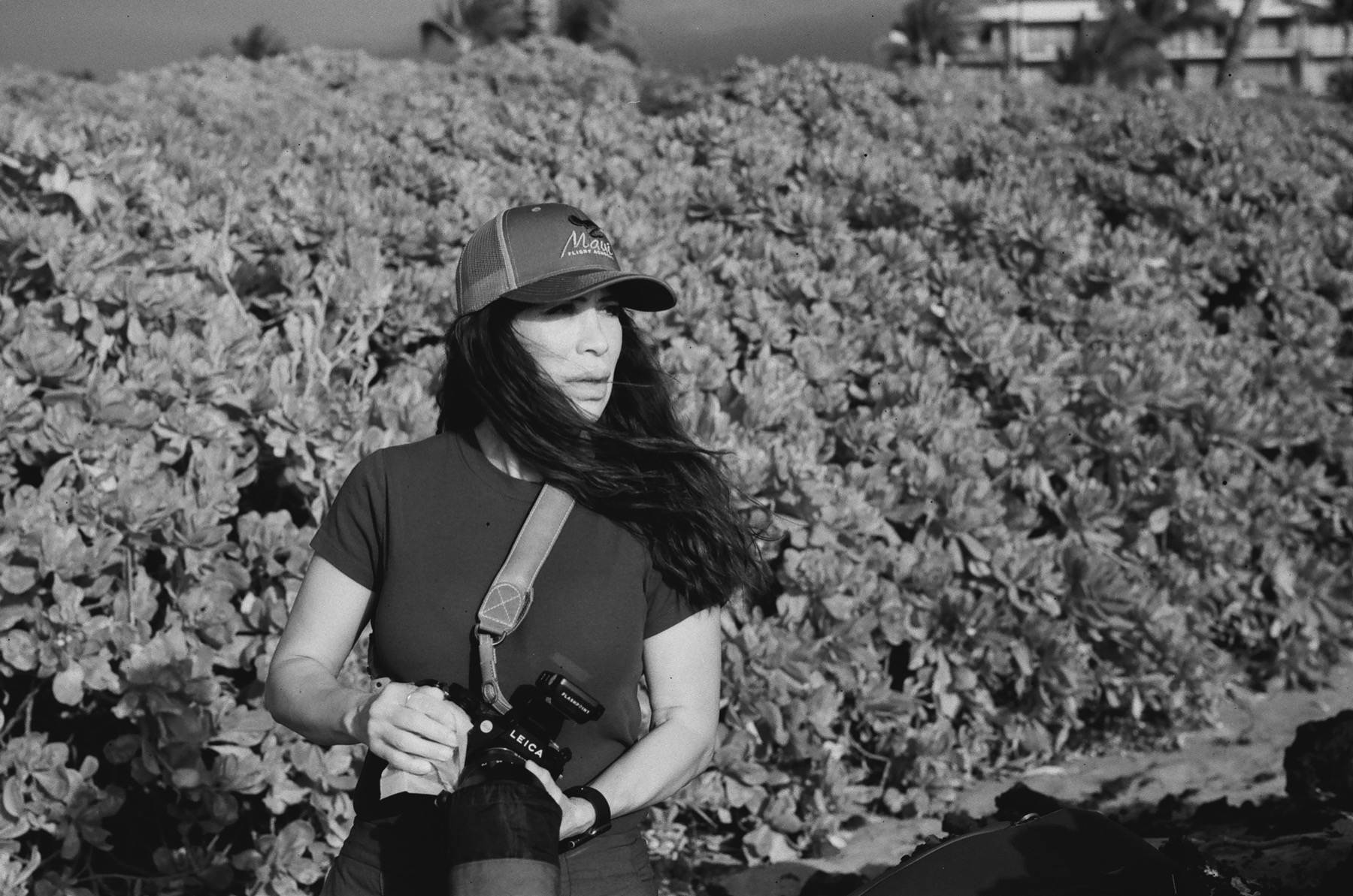 Jude Balter, Wailea Photo's monochrome specialist, holding a Leica camera on Maui