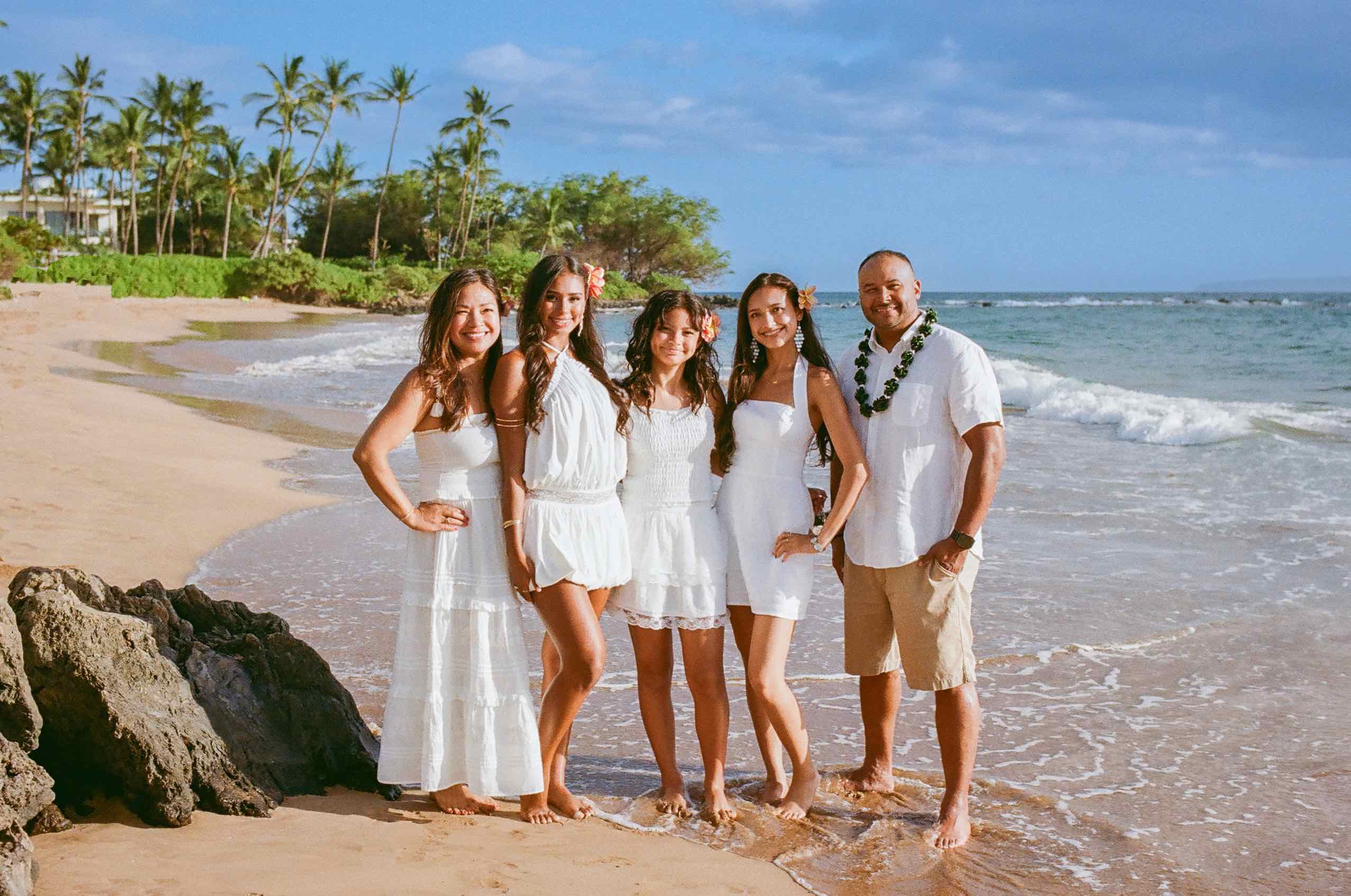 A family with daughters photographed during a Light and Bright session in Wailea