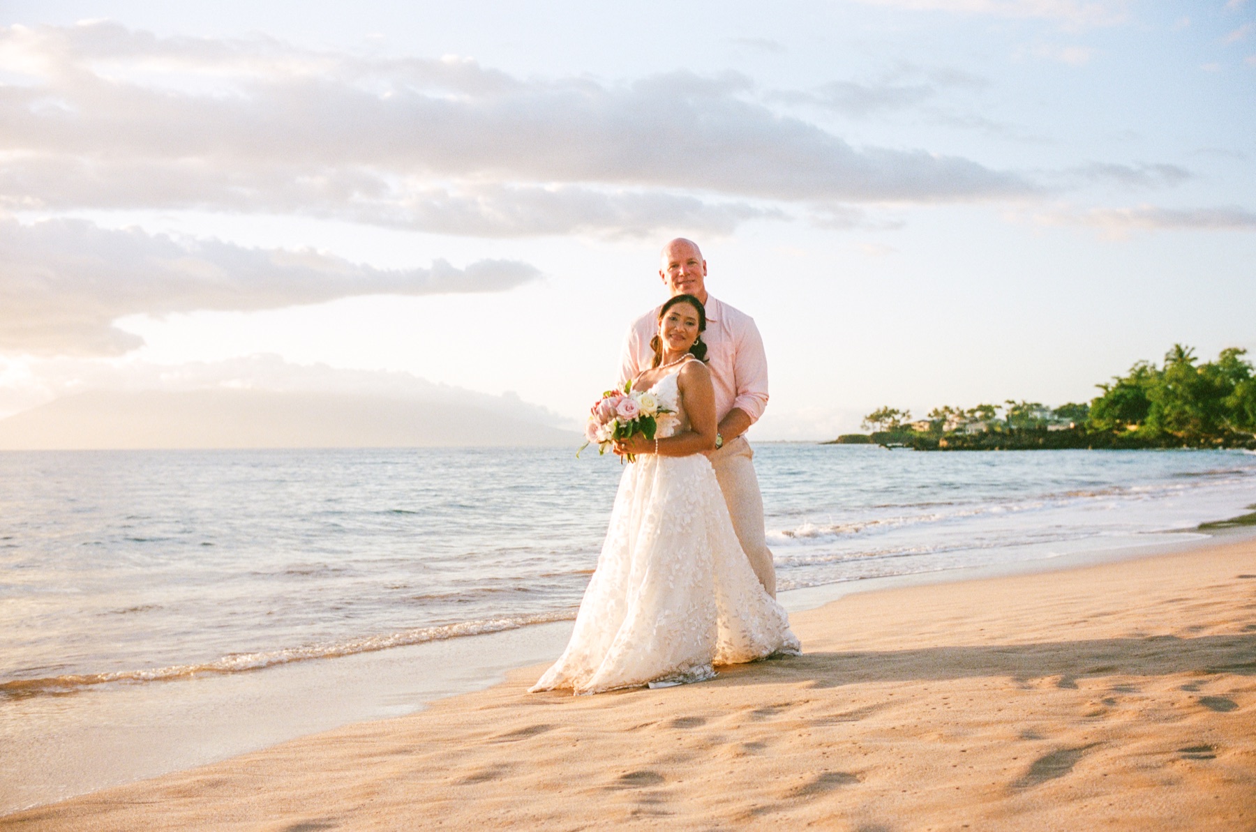 Maluaka Beach wedding portrait with calm ocean and South Maui evening light