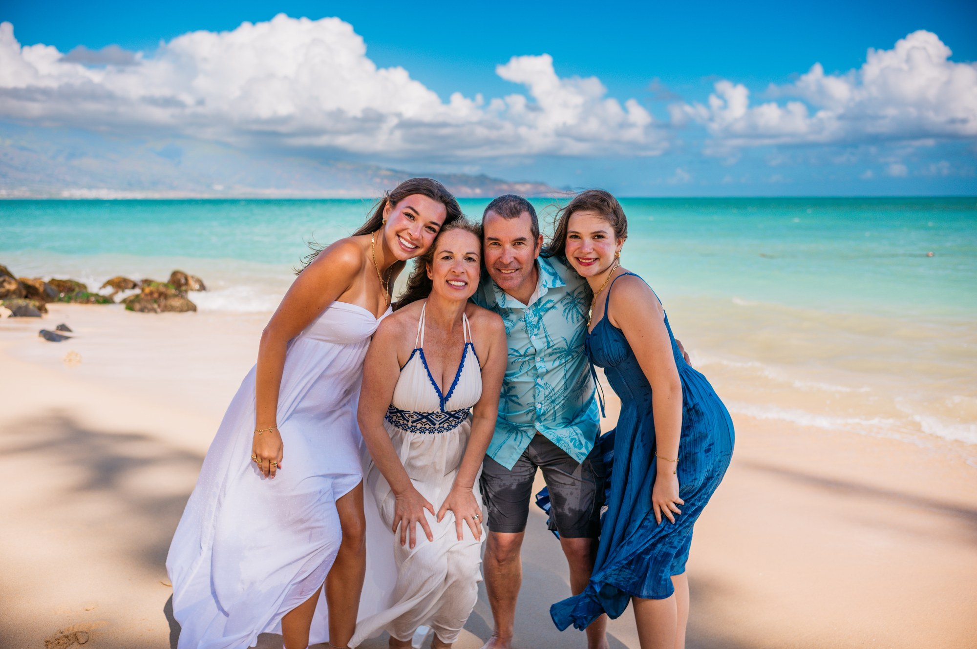 Portrait beside turquoise ocean water during a Wailea Photo session on Maui