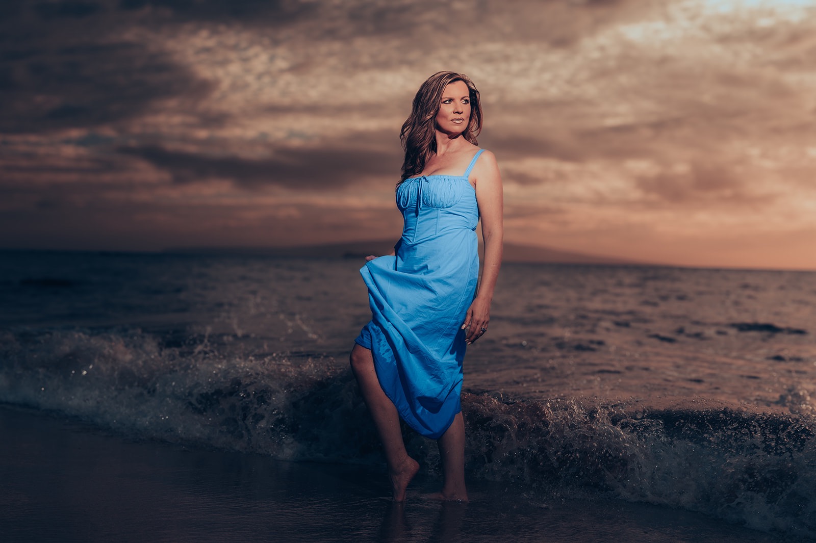A portrait photographed against a deep Maui sunset
