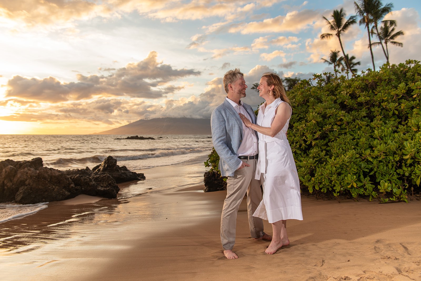 A couple photographed at sunset near the Andaz Maui in Wailea