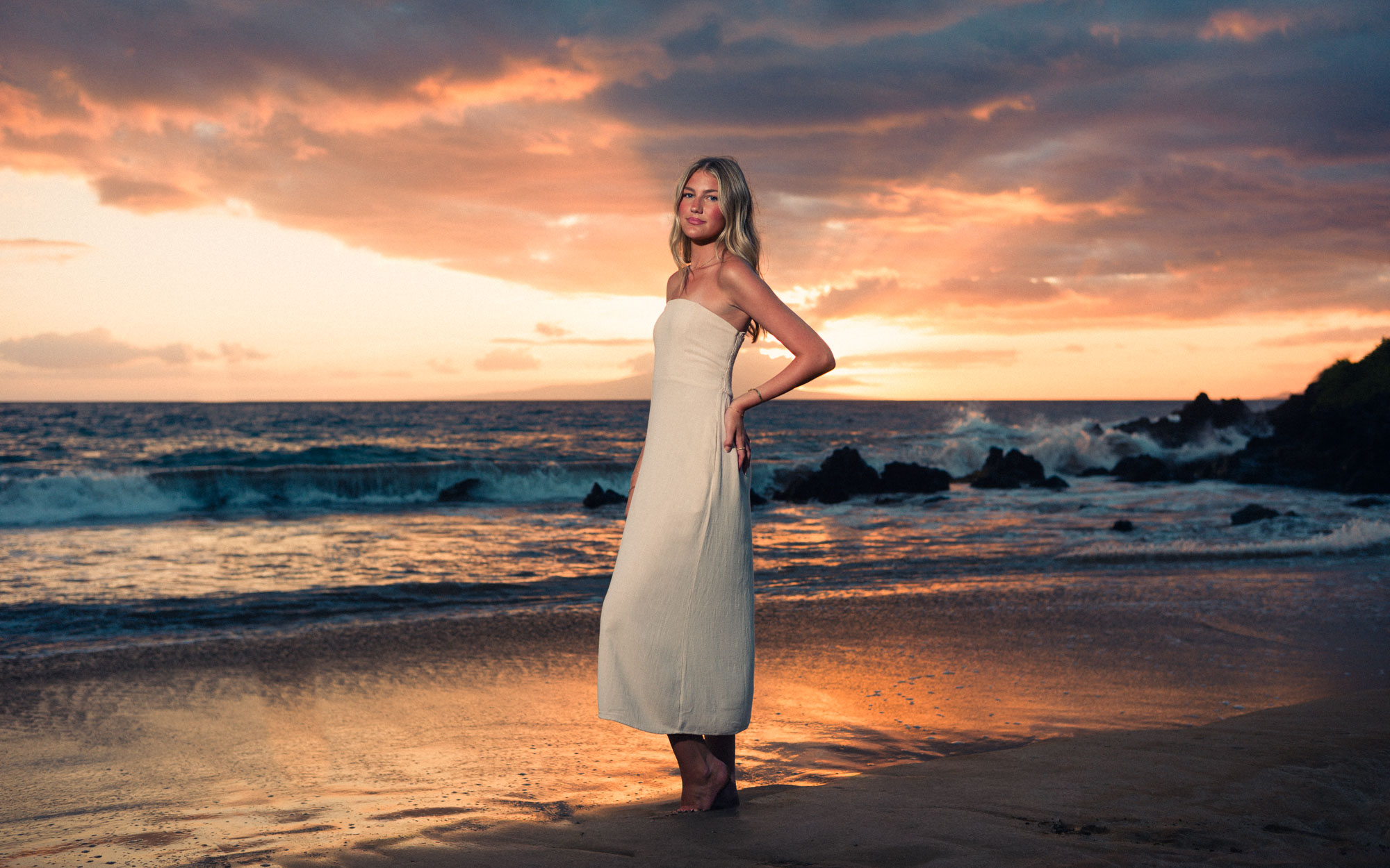 Solo portrait in a white dress on the beach at sunset in Maui - image by Wailea Photo®