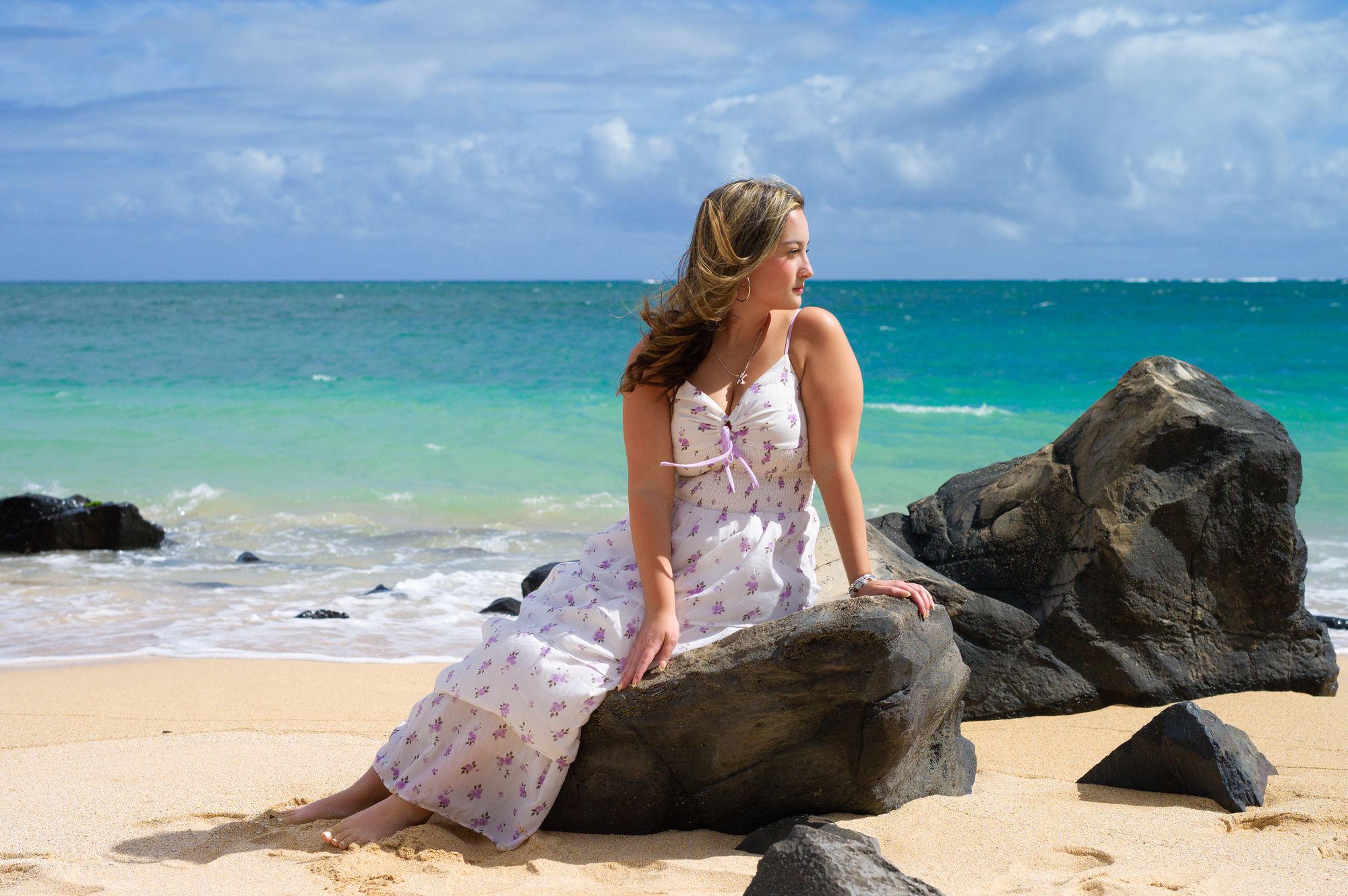 A family photography session at Maui's turquoise water beach