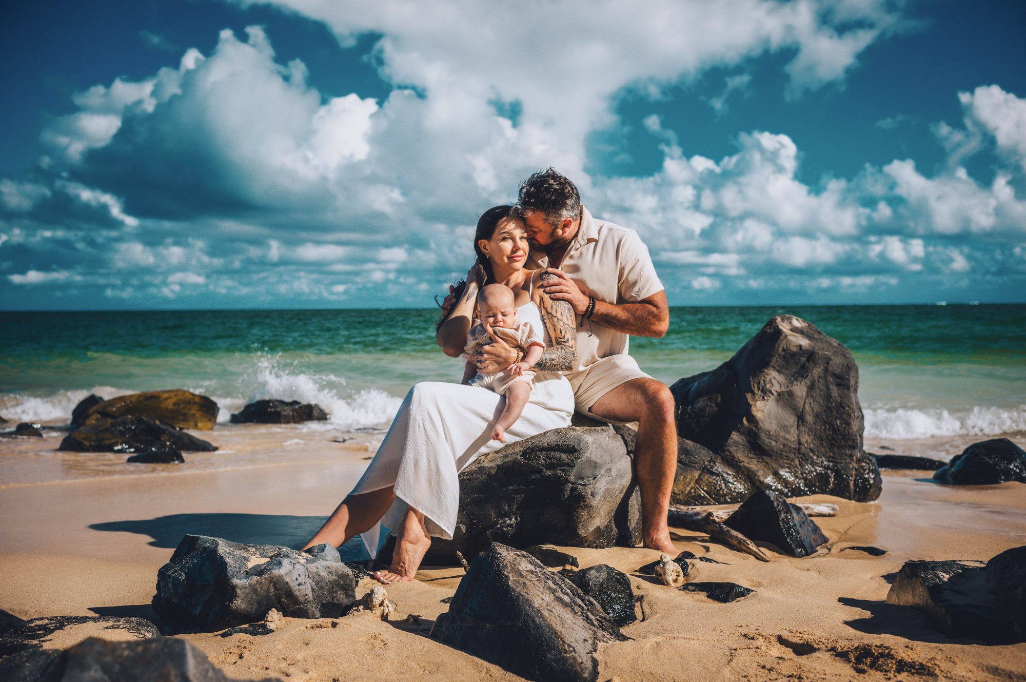 A family photography session at Maui's turquoise water beach
